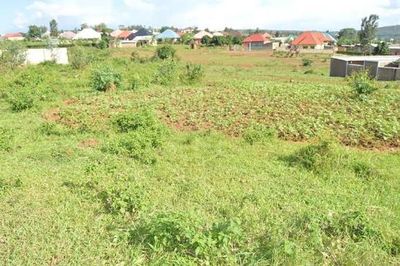 Investor calculating rental property return on investment for a house in Kigali, Rwanda