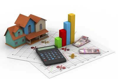 Homeowner reviewing a property valuation report before listing their house for sale in Kigali